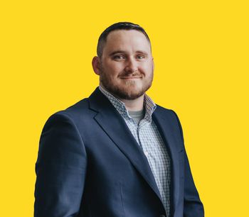 Portrait of Joey Brinkoetter, Broker/Agent.